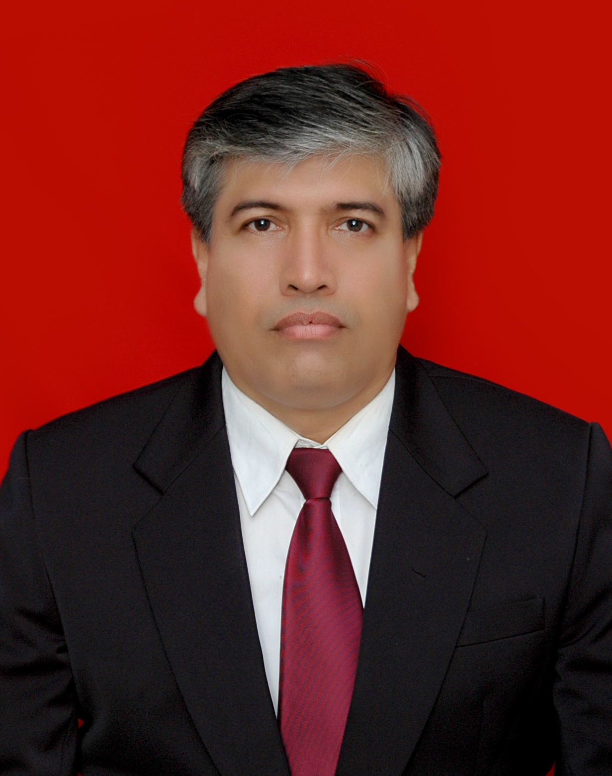Dr. Iman Jauhari, S.H., M.Hum.